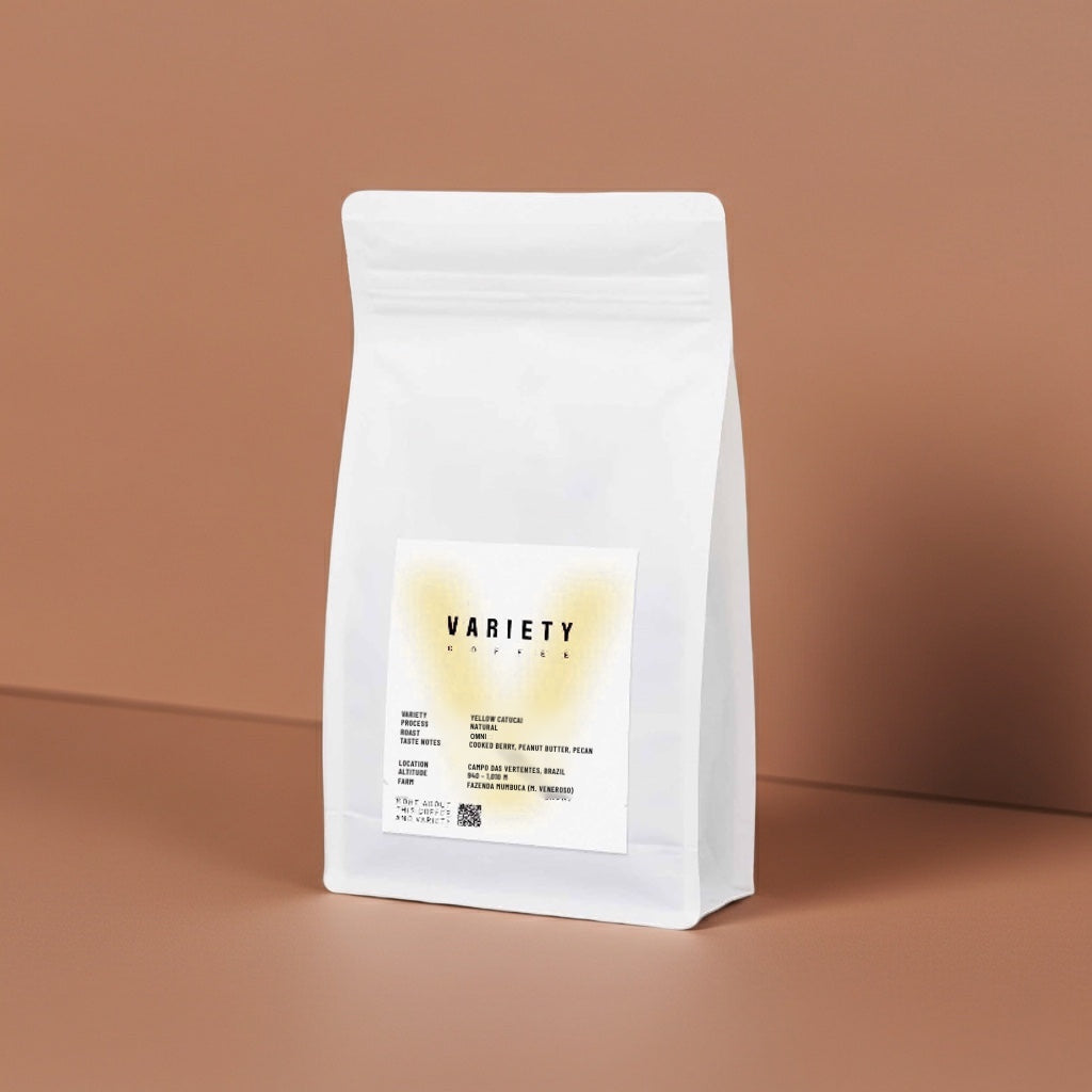 The 200 g Variety Coffee bag, Yellow Catucai edition, on a warm brown surface
